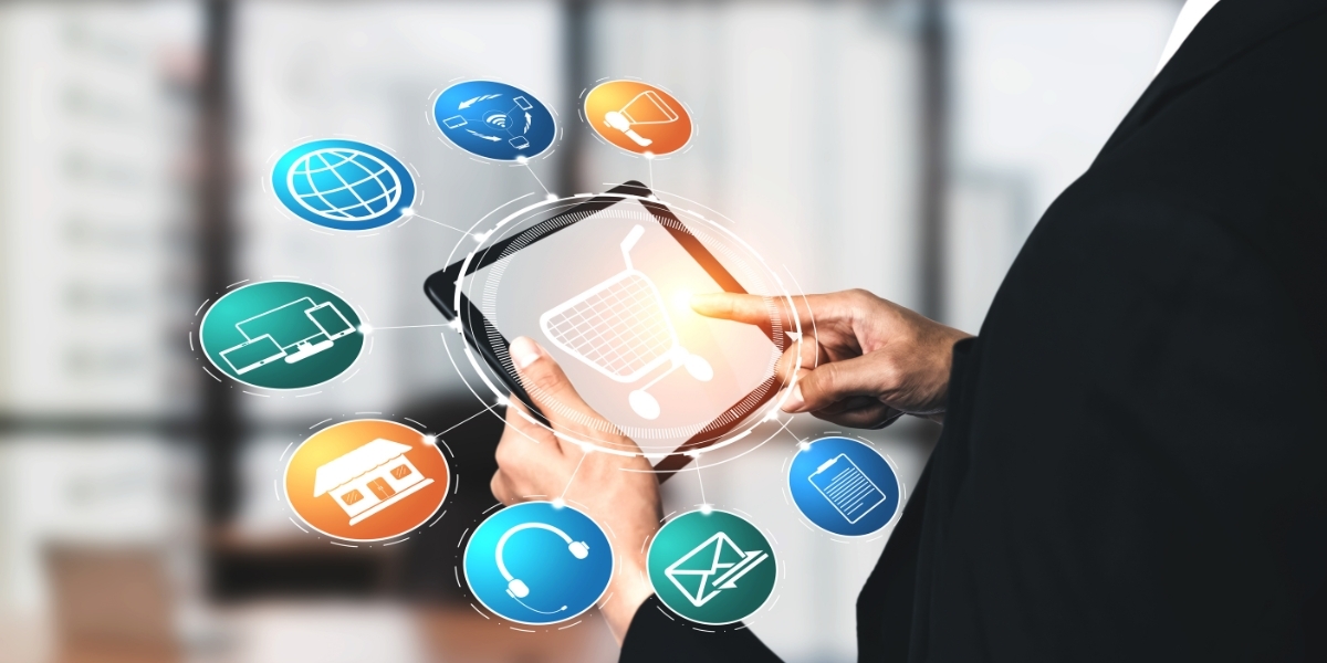 Person touching a tablet with a shopping cart image on it