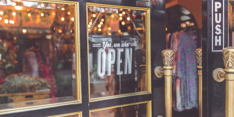 Open sign on a clothing store